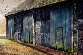 barn in the play of light and shadow