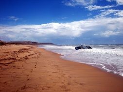 abandoned ship on the sea beach
