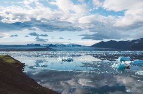 clouds over a glacier in Iceland