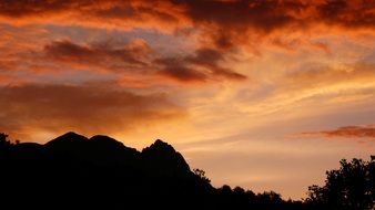 dark orange clouds over the mountains