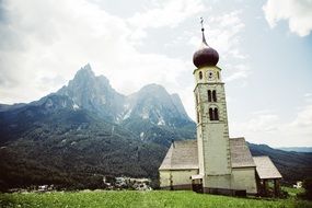 church among the picturesque alpine mountains in south tyrol