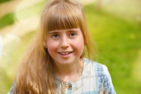girl with long white hair smiling