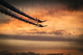 flight soar planes in suset sky