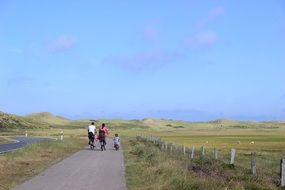 family on bikes in beautiful surroundings