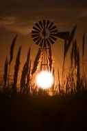 water mill at sunset