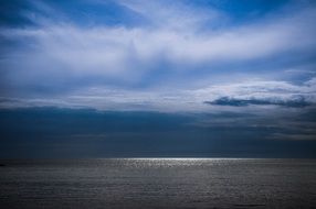 blue clouds over the sea