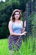 girl posing on grass in summer