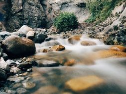 river streaming among rocks