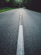 empty asphalt road among nature