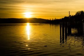 Yellow sunset on the lake