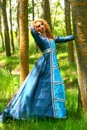 young woman in blue princess dress