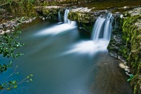 panorama of waterfalls near the natural pool in Wales