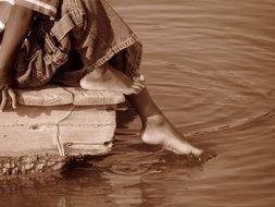 Old photo of the toe in water