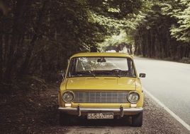 Old vintage retro car near the forest