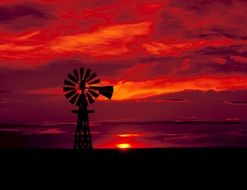 windmill in red sunset