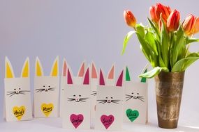 Paper rabbits and tulips in a vase