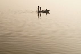 boat with fishermen on a lake