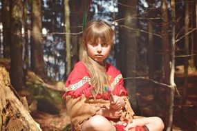 child girl in the forest