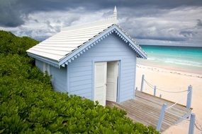 blue house on the coast in the Bahamas