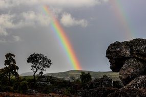 rainbows over picturesque landscapes in africa