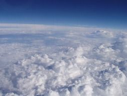 Beautiful white fluffy clouds in blue sky