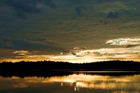 sunrise over the horizon lake