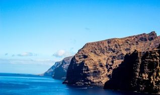 landscape of large beach rocks in los gigantes