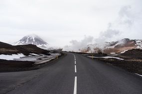 high road between winter mountains