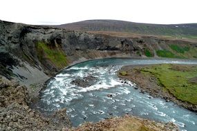cold stromy river in iceland