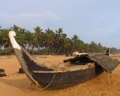 Picture of wooden boat on a beach