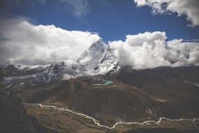 landscape of hills and mountain lake