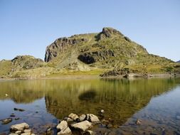 mountain reflection in a lake in france