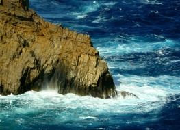 Surf near rock formations