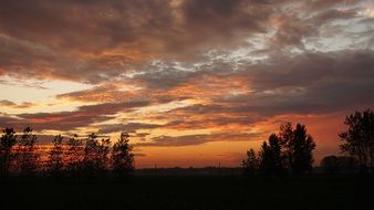 Orange clouds at the sunset time