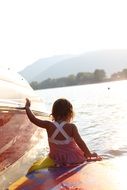 a child in the summer water