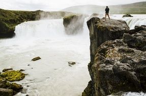 waterfall among the rocks in iceland