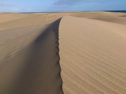 landscape of long sand dune in desert