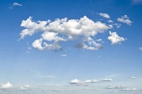 Beautiful white clouds in blue gradient sky