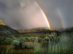 double rainbow over nice valley