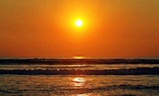 golden sky over the sea at sunrise