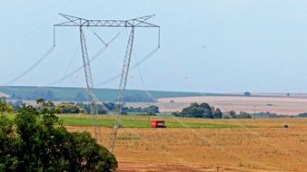 distant view of cars on the road in a picturesque landscape