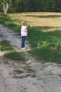 little girl on road
