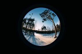 View through the lens on a snowy landscape