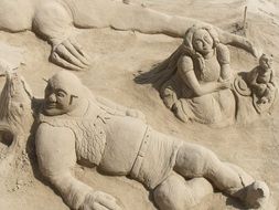 sand figures on the beach