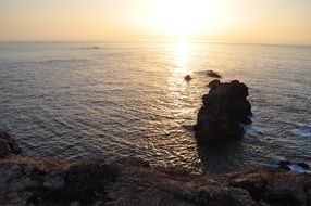 rocks in the ocean near the coast