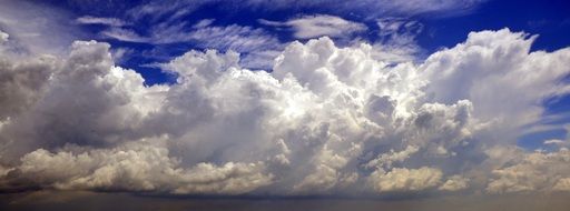 banner with white fluffy clouds