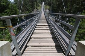 mountain suspension bridge hike trek view