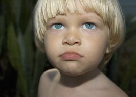 young blond boy with blue eyes