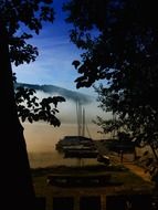 view from the black forest to the lake with boats