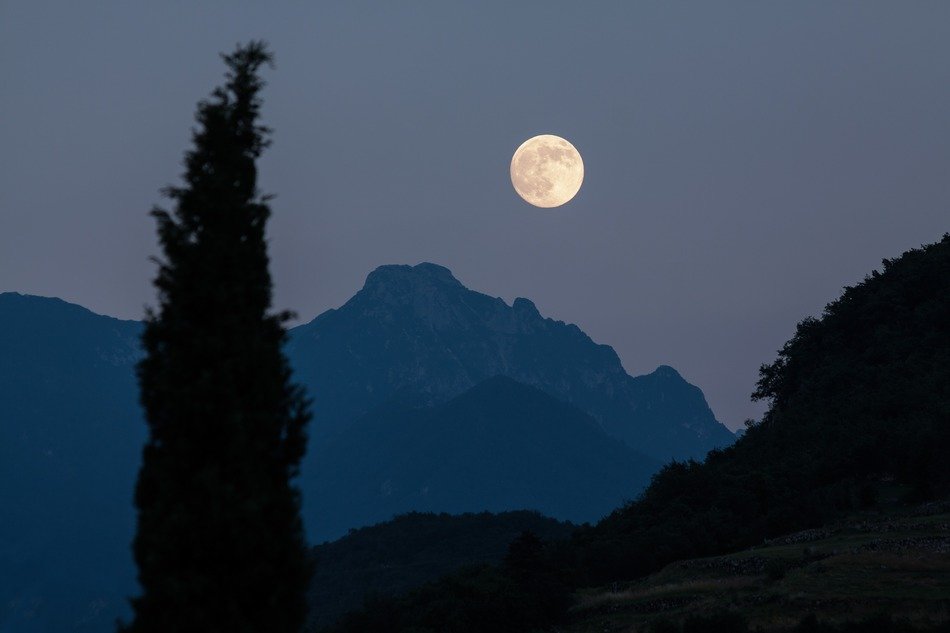 moon over the silhouettes of picturesque nature of cyprus